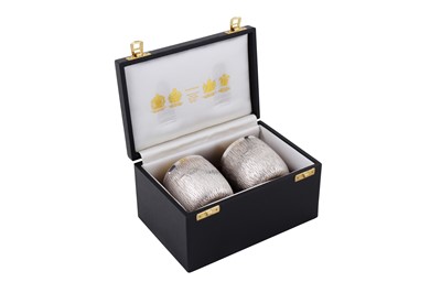 Lot 458 - A cased pair of Elizabeth II modernist sterling silver tumblers, London 1970 by Gerald Benney (1930-2008)