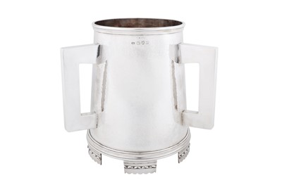 Lot 482 - A large George V sterling silver tyg wine cooler, London 1914 by Kemp Brothers
