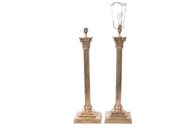 Lot 72 - A pair of large silver plated Corinthian column table lamps, 20th Century