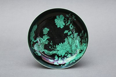 Lot 41 - A RARE CHINESE BLACK-GROUND AND GREEN-ENAMELLED FAMILLE-NOIRE 'BIRDS' DISH