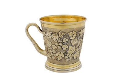 Lot 507 - A Victorian sterling silver gilt ‘fruiting vine’ mug, London 1881 by John Mortimer Hunt and Robert Roskell
