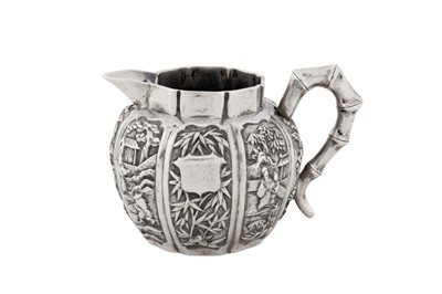 Lot 266 - A late 19th century Chinese export silver milk or cream jug, Canton dated 1897, marked Qiao Yuan Sheng, retailed by Wo Shing of Shanghai