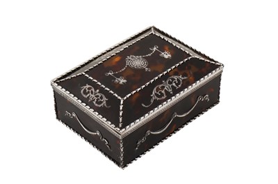 Lot 143 - An Edwardian sterling silver and tortoiseshell jewellery box, London 1904 by William Comyns