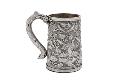 Lot 264 - A late 19th / early 20th century Chinese export silver small mug, Canton circa 1900, marked Zhao Ji, retailed by Wo Long