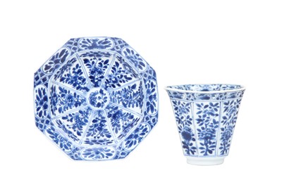 Lot 16 - A CHINESE BLUE AND WHITE 'BLOSSOMS' CUP AND SAUCER