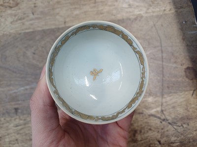 Lot 49 - A RARE CHINESE EN-GRISAILLE 'IGNATIUS OF LOYOLA' CUP AND SAUCER
