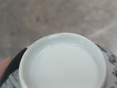 Lot 49 - A RARE CHINESE EN-GRISAILLE 'IGNATIUS OF LOYOLA' CUP AND SAUCER