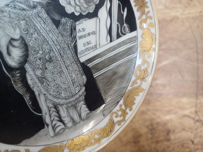 Lot 49 - A RARE CHINESE EN-GRISAILLE 'IGNATIUS OF LOYOLA' CUP AND SAUCER