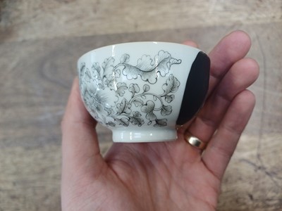 Lot 49 - A RARE CHINESE EN-GRISAILLE 'IGNATIUS OF LOYOLA' CUP AND SAUCER