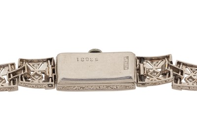 Lot 266 - A LADY'S ART DECO PLATINUM AND DIAMOND COCKTAIL WATCH
