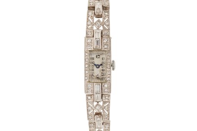 Lot 266 - A LADY'S ART DECO PLATINUM AND DIAMOND COCKTAIL WATCH