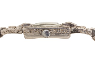 Lot 266 - A LADY'S ART DECO PLATINUM AND DIAMOND COCKTAIL WATCH