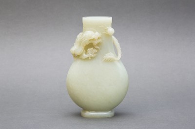 Lot 60 - A CHINESE PALE CELADON JADE 'DRAGON' VASE