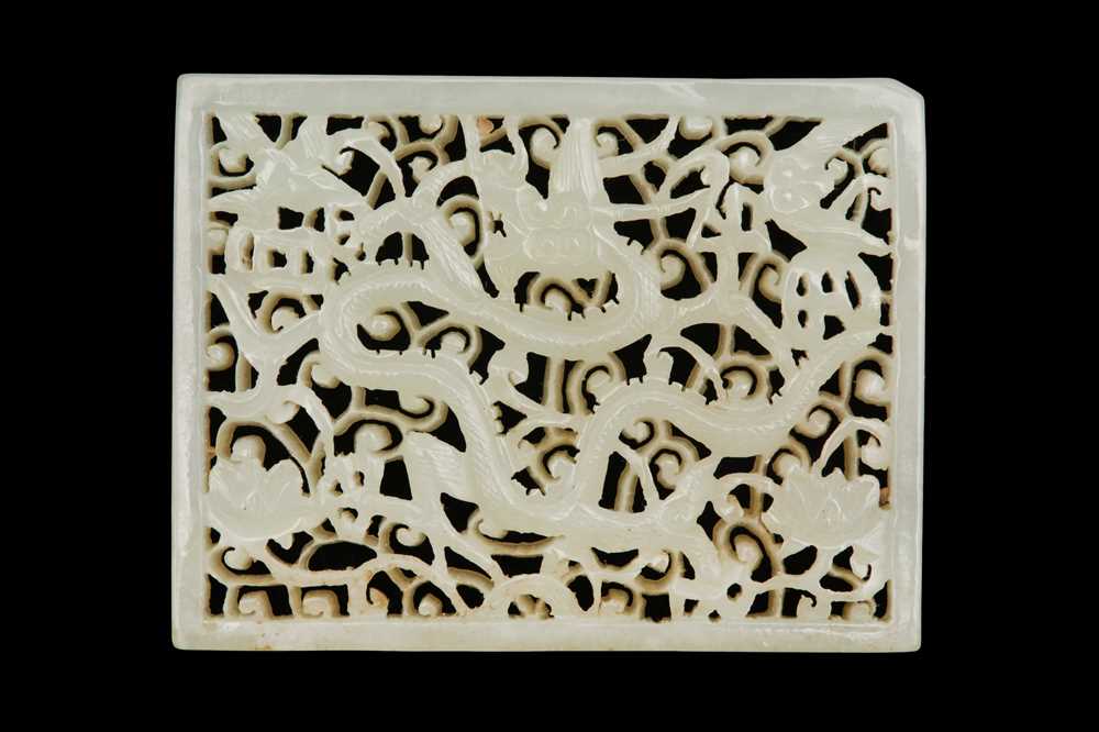 Lot 58 - A CHINESE CARVED CELADON JADE 'DRAGON' PLAQUE