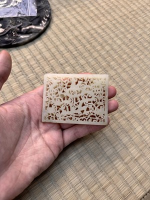 Lot 58 - A CHINESE CARVED CELADON JADE 'DRAGON' PLAQUE