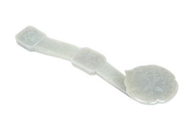 Lot 61 - A CHINESE CELADON JADE RUYI SCEPTRE