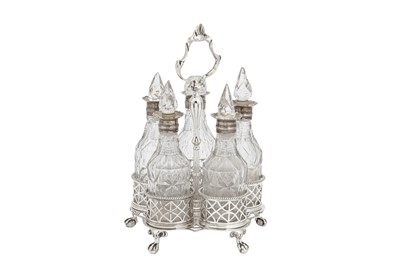 Lot 450 - An early George III sterling silver five bottle sauce cruet, London 1762 by Erick Romer