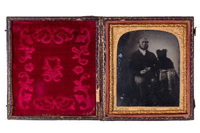 Lot 14 - An Ambrotype Portrait of A Man Servant and his Dog
