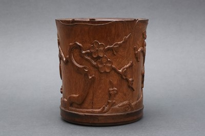 Lot 82 - A RARE CHINESE HUANGHUALI 'BLOSSOMS' BRUSH POT, BITONG