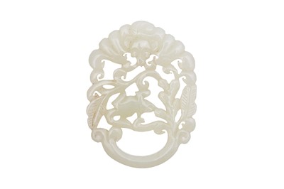Lot 535 - A CHINESE RETICULATED 'SQUIRREL AND GRAPEVINE' JADE