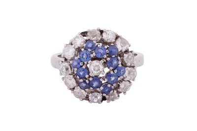 Lot 12 - A SAPPHIRE AND DIAMOND CLUSTER RING