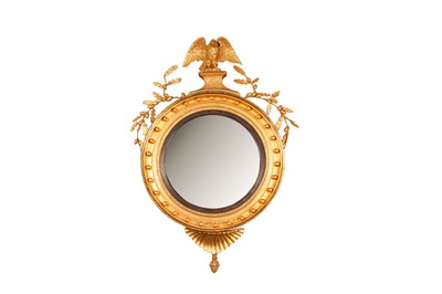 Lot 134 - A REGENCY GILTWOOD CONVEX MIRROR