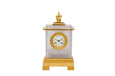 Lot 282 - MANNER OF BACCARAT; A FRENCH CRYSTAL AND ORMOLU MANTEL CLOCK