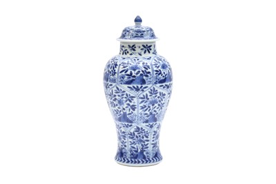 Lot 29 - A CHINESE BLUE AND WHITE VASE AND COVER