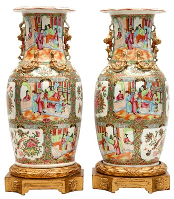 Lot 558 - A PAIR OF CHINESE EXPORT CANTON FAMILLE-ROSE MOUNTED VASES