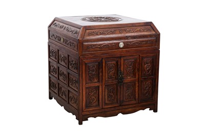 Lot 83 - A FINE AND RARE CHINESE HUANGHUALI HARDWOOD 'CHILONG' CABINET