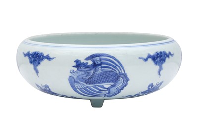 Lot 824 - A CHINESE BLUE AND WHITE 'PHOENIX' TRIPOD CENSER