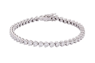 Lot 113 - A DIAMOND LINE BRACELET