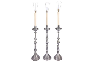 Lot 198 - A SET OFTHREE PEWTER COLOURED METAL STANDARD LAMPS