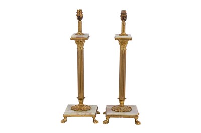 Lot 205 - A PAIR OF BRASS AND ONYX TABLE LAMPS