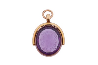 Lot 54 - AN AMETHYST SWIVEL FOB