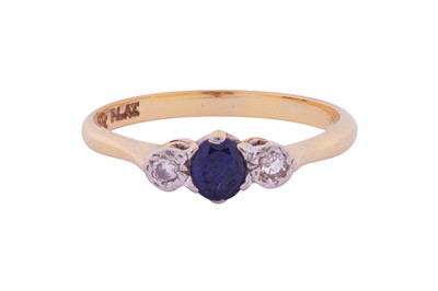 Lot 38 - A SAPPHIRE AND DIAMOND THREE-STONE RING
