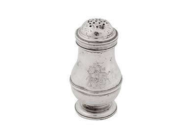 Lot 476 - A George I Britannia standard silver pepper pot, London 1715 by Charles Adam (reg. 1st Feb 1703)