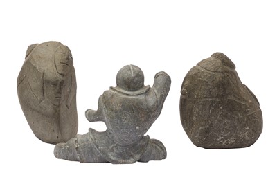 Lot 280 - A GROUP OF THREE CARVED STONE INUIT SCULPTURES