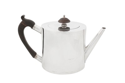 Lot 446 - A George III Irish sterling silver teapot, Dublin circa 1780 by John Laughlin jnr (probably)