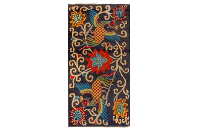 Lot 20 - A FINE TIBETAN RUG