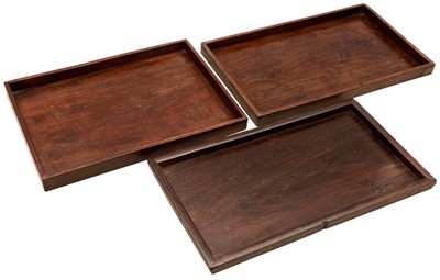 Lot 789 - THREE CHINESE HARDWOOD HUANGHUALI TRAYS