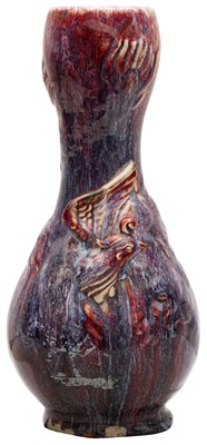 Lot 47 - A CHINESE FLAMBÉ-GLAZED MOULDED 'PHOENIX' VASE