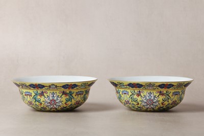 Lot 12 - A PAIR OF RARE AND FINE CHINESE FAMILLE-ROSE YELLOW-GROUND BOWLS