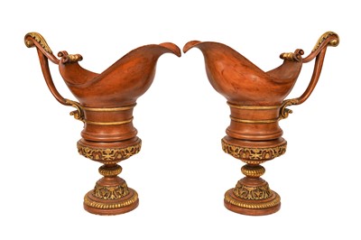 Lot 180 - A LARGE PAIR OF FRENCH CARVED WOOD AND PARCEL GILT EWERS, 19TH CENTURY