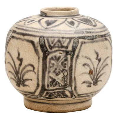 Lot 273 - A Chinese blue and white faceted 'floral' jar, Ming dynasty