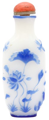 Lot 997 - A CHINESE BLUE OVERLAY GLASS 'LOTUS POND' SNUFF BOTTLE