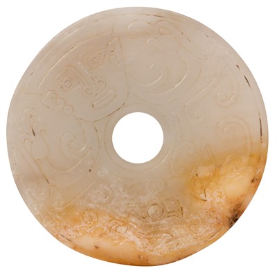 Lot 632 - A CHINESE PALE CELADON HARDSTONE DISC, BI