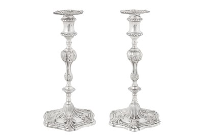 Lot 470 - A pair of George III Irish sterling silver candlesticks, Dublin 1776 by William Hughes (active 1767-84)