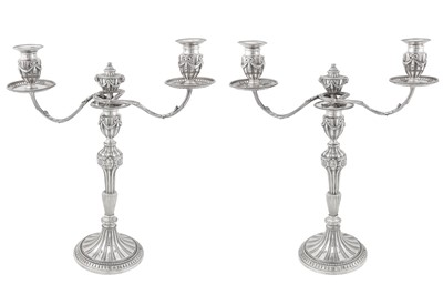 Lot 445 - A pair of George III sterling silver twin branch candelabra, London 1776 by Henry Hallsworth