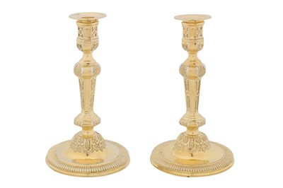Lot 307 - A pair early to mid - 20th century French 950 standard silver gilt candlesticks, Paris circa 1940 by Souche Frères (reg. 1st Oct 1925)